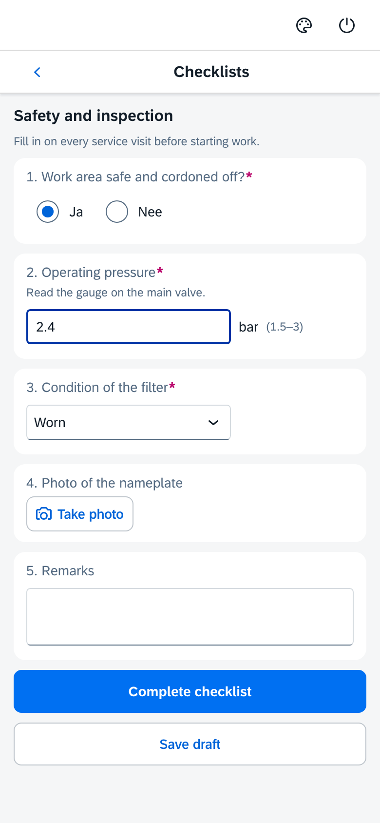 A checklist in the KFSM app: yes/no question, a pressure reading with limits, a choice, a photo and remarks